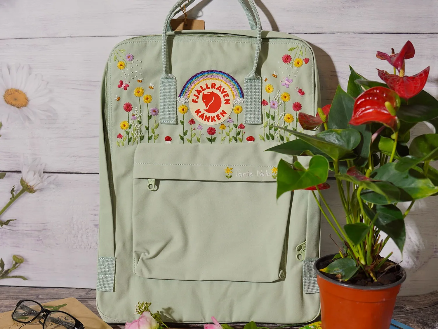 Fjallraven Kanken backpack embroidery design with flower and rainbow embroidery